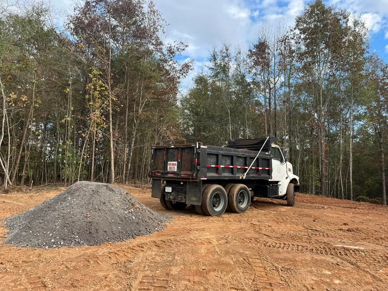 Dump truck and aggregate — image from AAA Land Management’s existing portfolio