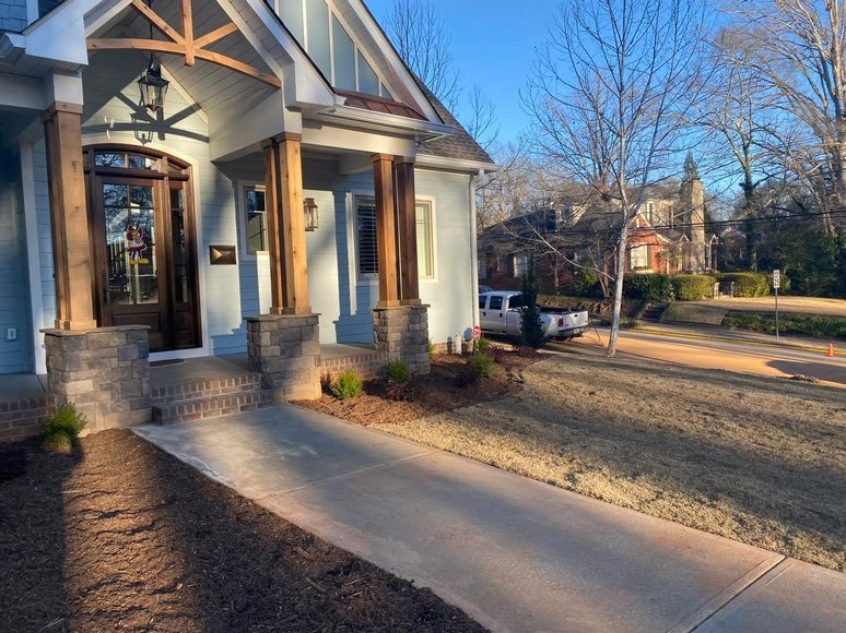 Walkway beside a home — image from AAA Land Management’s existing portfolio