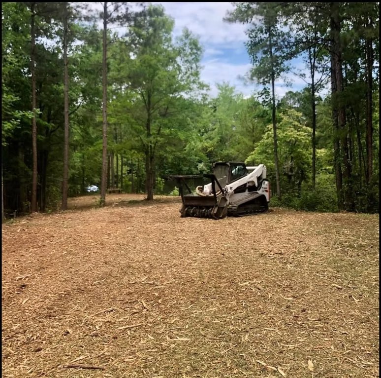 Compact equipment at a cleared site — image from AAA Land Management’s existing portfolio